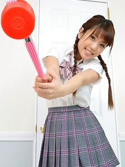 Mizuho Shiraishi with uniform and pigtails plays like child